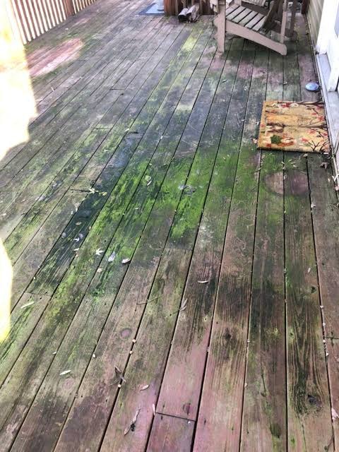 Deck before pressure washing — weathered and dirty